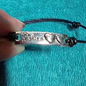 Silvertone 'Sisters' Heart Bracelet Black Cord